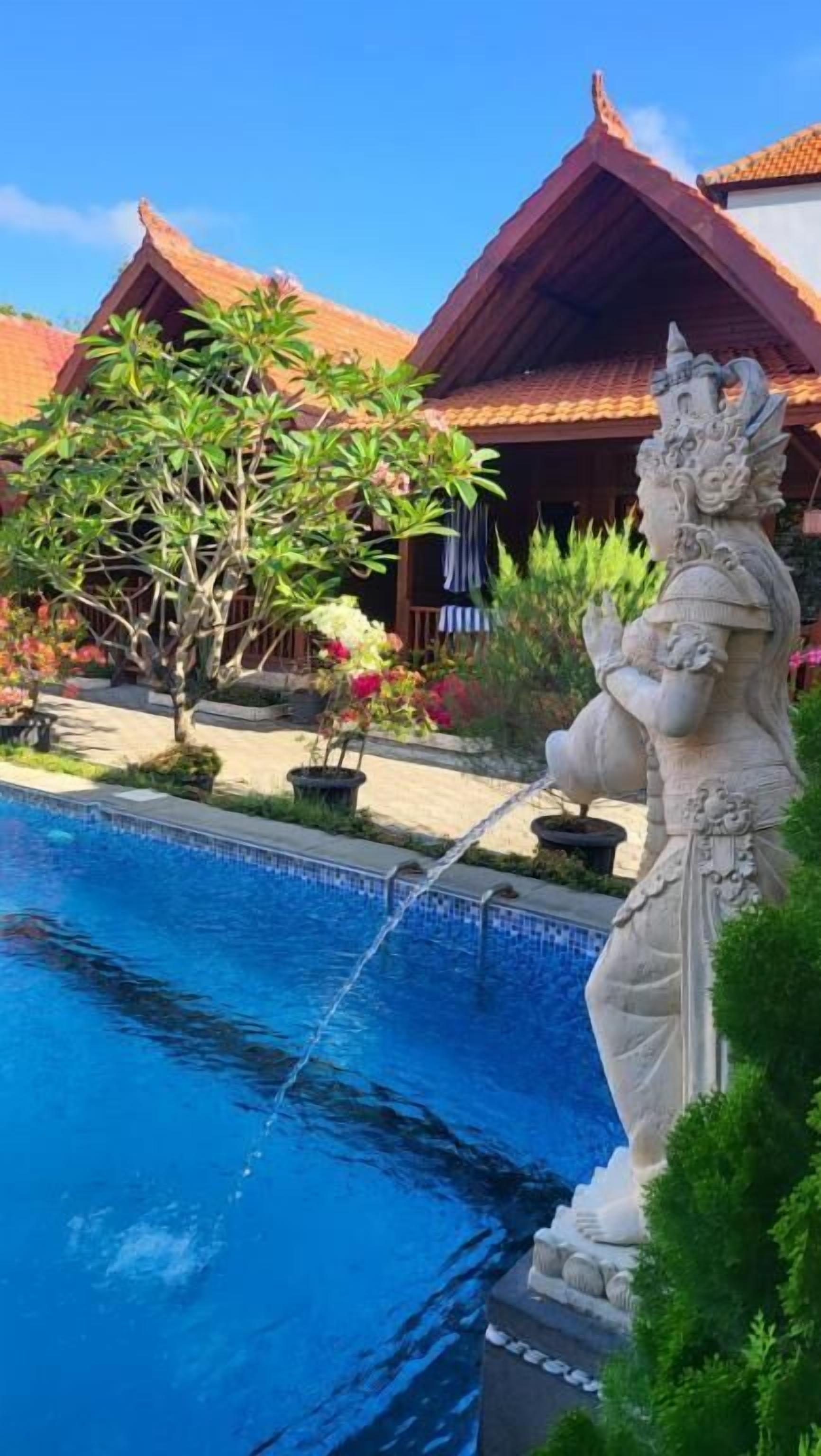 Studio, Multiple Beds, Patio, Garden View | Pool | Outdoor pool, pool umbrellas, sun loungers