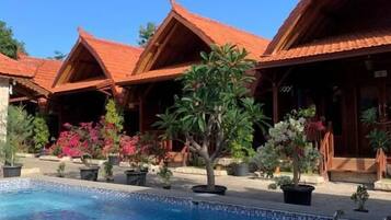 Outdoor pool, pool umbrellas, sun loungers