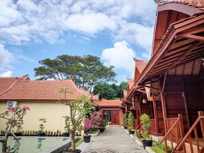 Deluxe Double Room, Patio, Pool View | Pool | Outdoor pool, pool umbrellas, sun loungers - Uli Wood Villa Jimbaran (Ungasan)