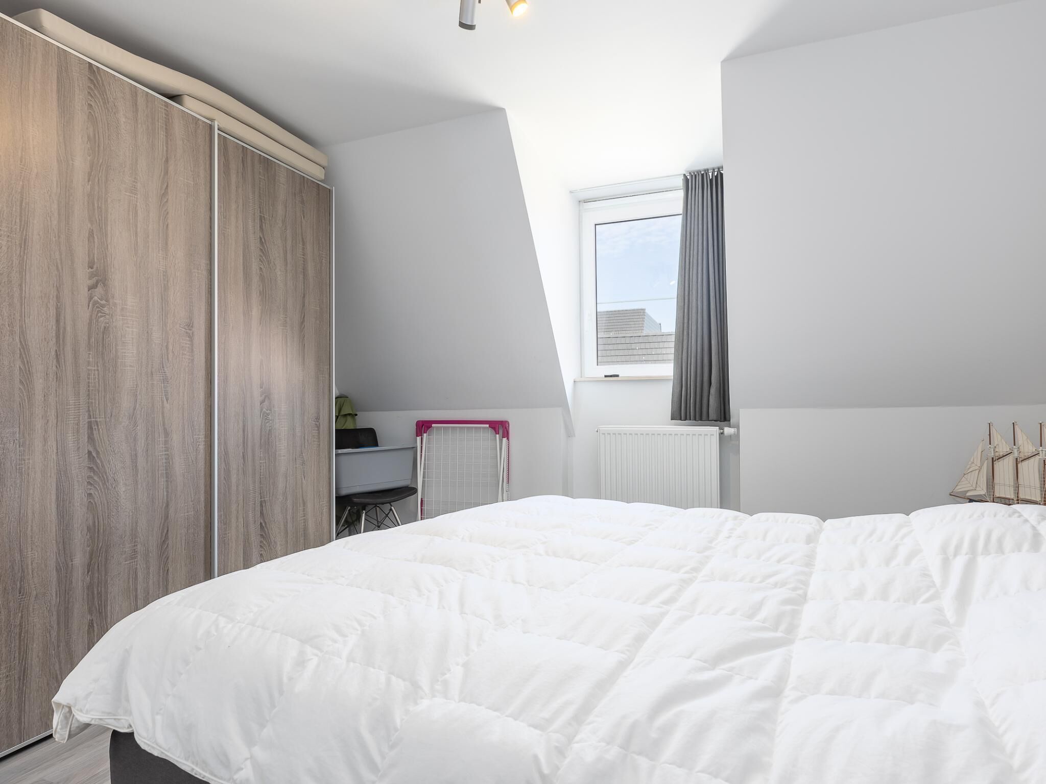 2 slaapkamers, een strijkplank/strijkijzer, internet