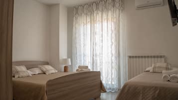 Comfort Room | Desk, laptop workspace, blackout curtains, soundproofing