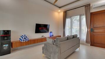 Villa, Balcony, Pool View | Living area | 43-inch Smart TV with digital channels, Netflix, streaming services