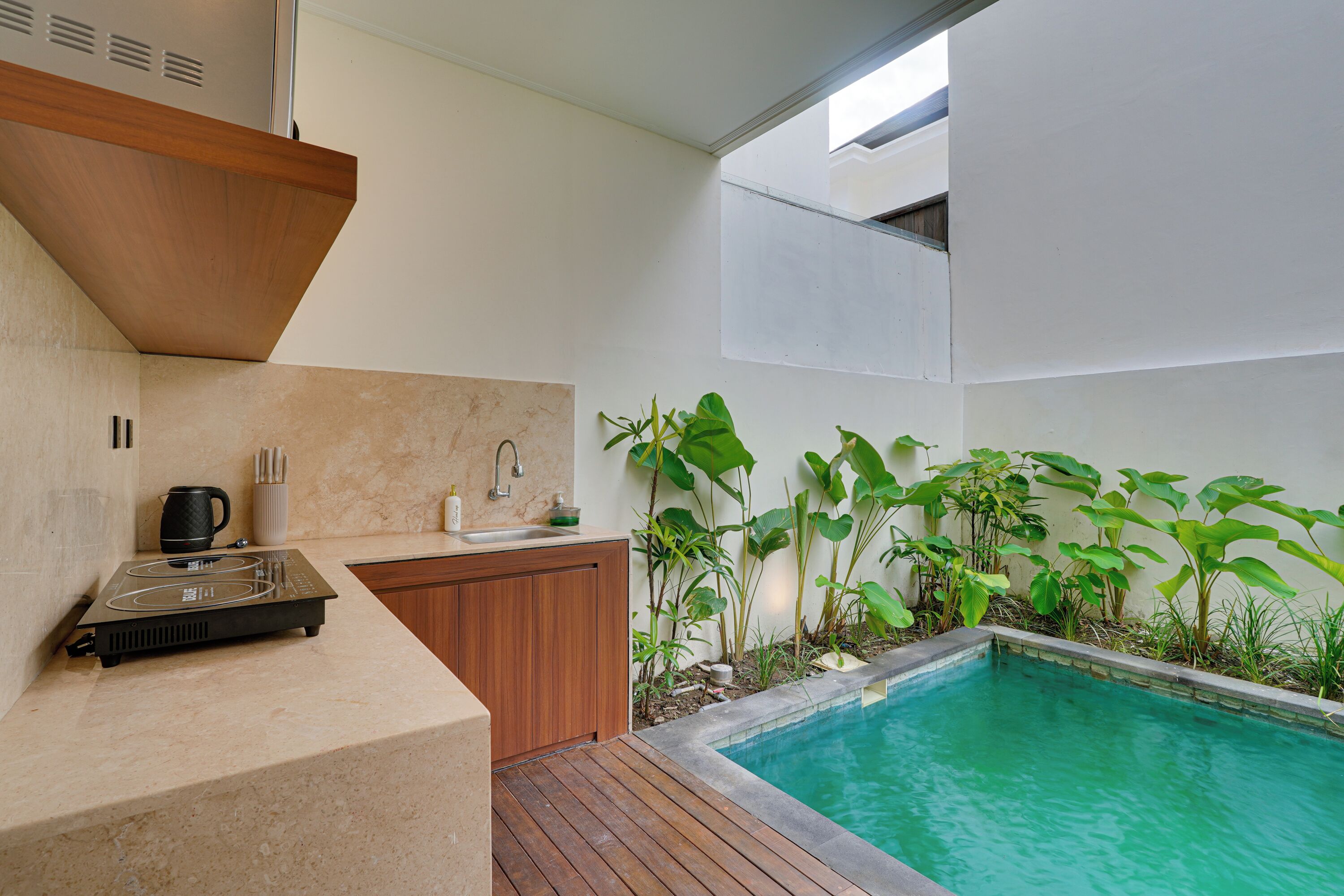 Villa, Balcony, Pool View | Private kitchen | Electric kettle, dining tables