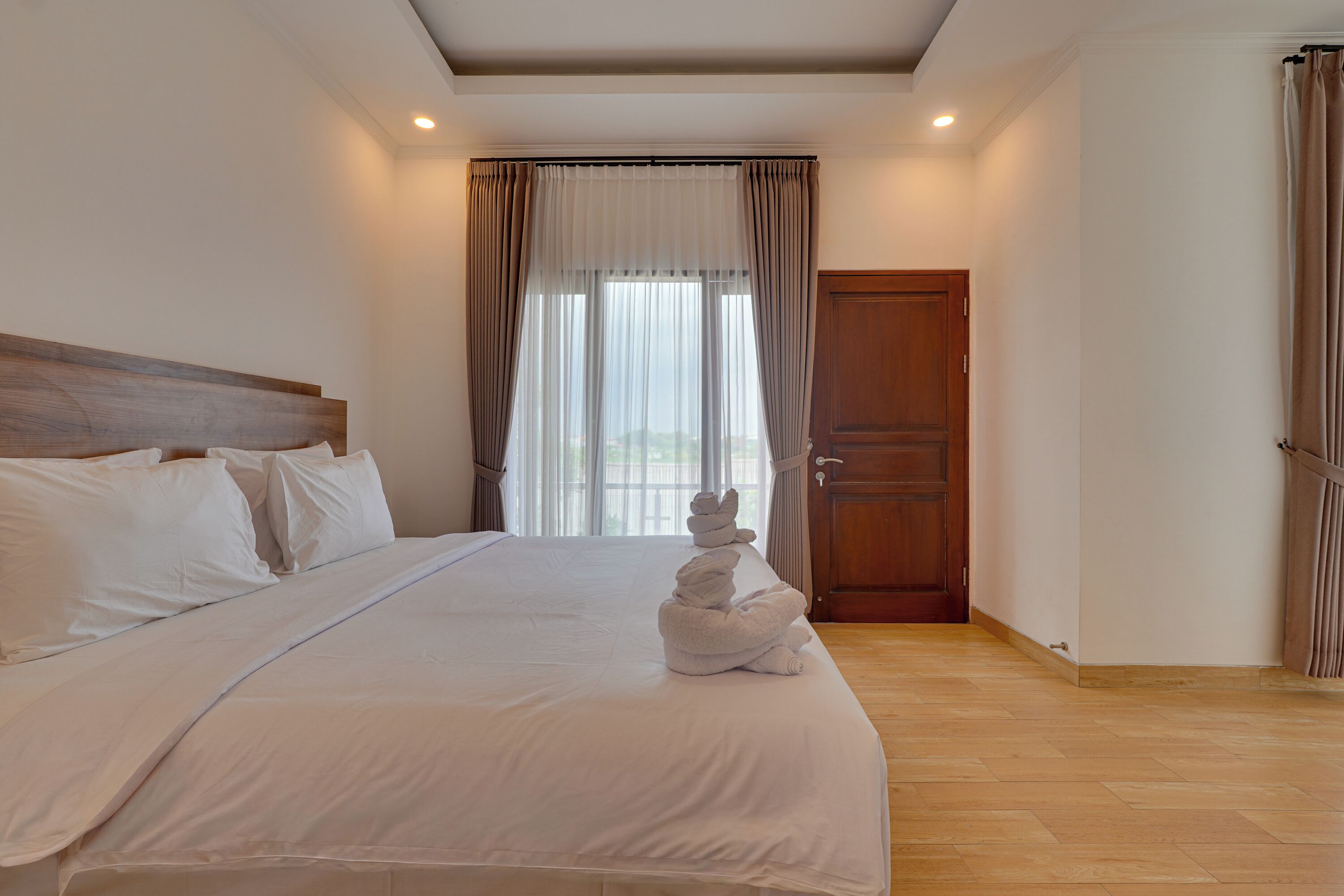 Biệt thự, ban công, quang cảnh hồ bơi | Két bảo mật tại phòng, truy cập Internet không dây miễn phí 