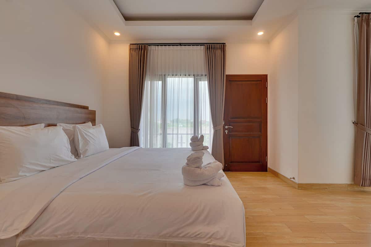 Biệt thự, ban công, quang cảnh hồ bơi | Két bảo mật tại phòng, truy cập Internet không dây miễn phí