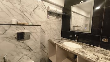 Shower, towels, soap, shampoo