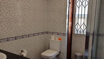 Apartment, Balcony, City View | Bathroom | Shower, towels, toilet paper