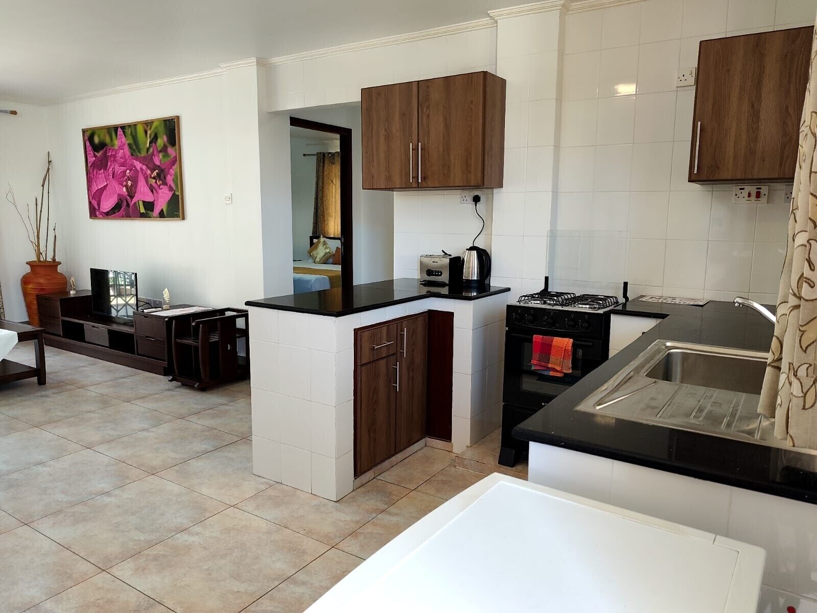 Leilighet, balkong, byutsikt | Eget kjøkken | Kjøleskap, ovn og kjøkkenutstyr