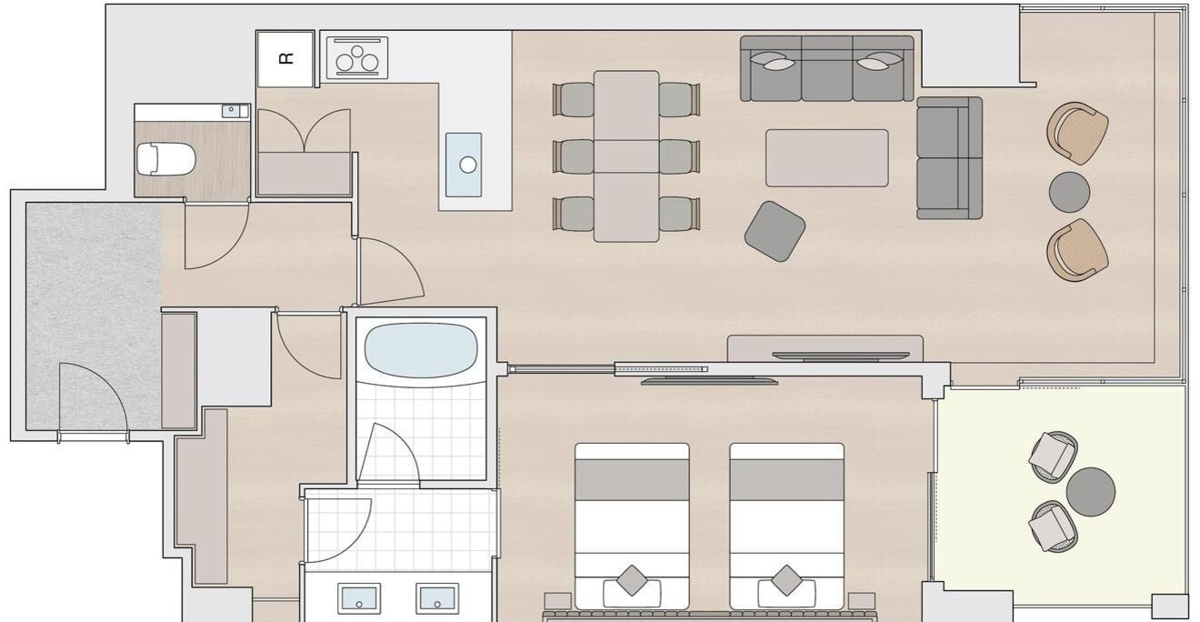 Un plan d’aménagement de chambre d’hôtel comprenant une salle de bain, un coin repas, un salon et une chambre à coucher.