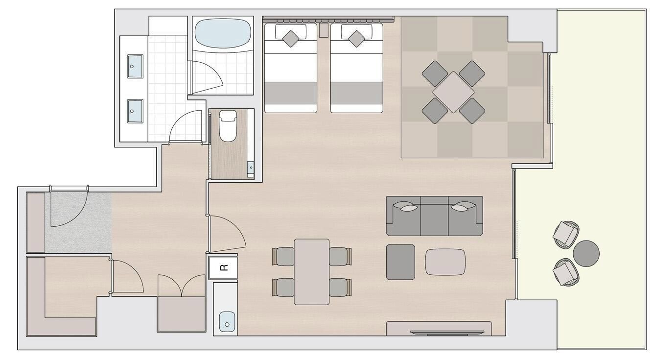 Distribución de una habitación de hotel que incluye un baño, un comedor, una sala de estar y una pequeña cocina.