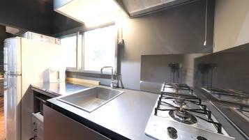 Fridge, microwave, stovetop, cookware/dishes/utensils