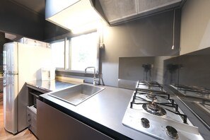 Fridge, microwave, stovetop, cookware/dishes/utensils