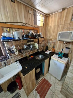 Private kitchen - Kitnets com AR Condicionado na Praia (Salvador)