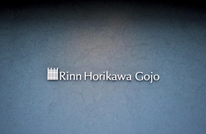 Un logotipo con el texto 'Rinn Horikawa Gojo'.
