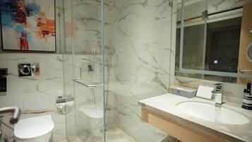 Premier Room, 1 King Bed | Bathroom | Hair dryer, slippers, towels, soap