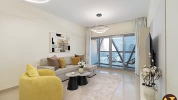 Luxury-Apartment, Balkon, Stadtblick | Wohnbereich