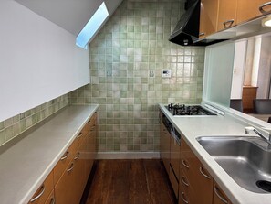 Apartment | Private kitchen | Fridge, microwave, stovetop, electric kettle - Dream Terrace One Casa Dali (Tokyo)