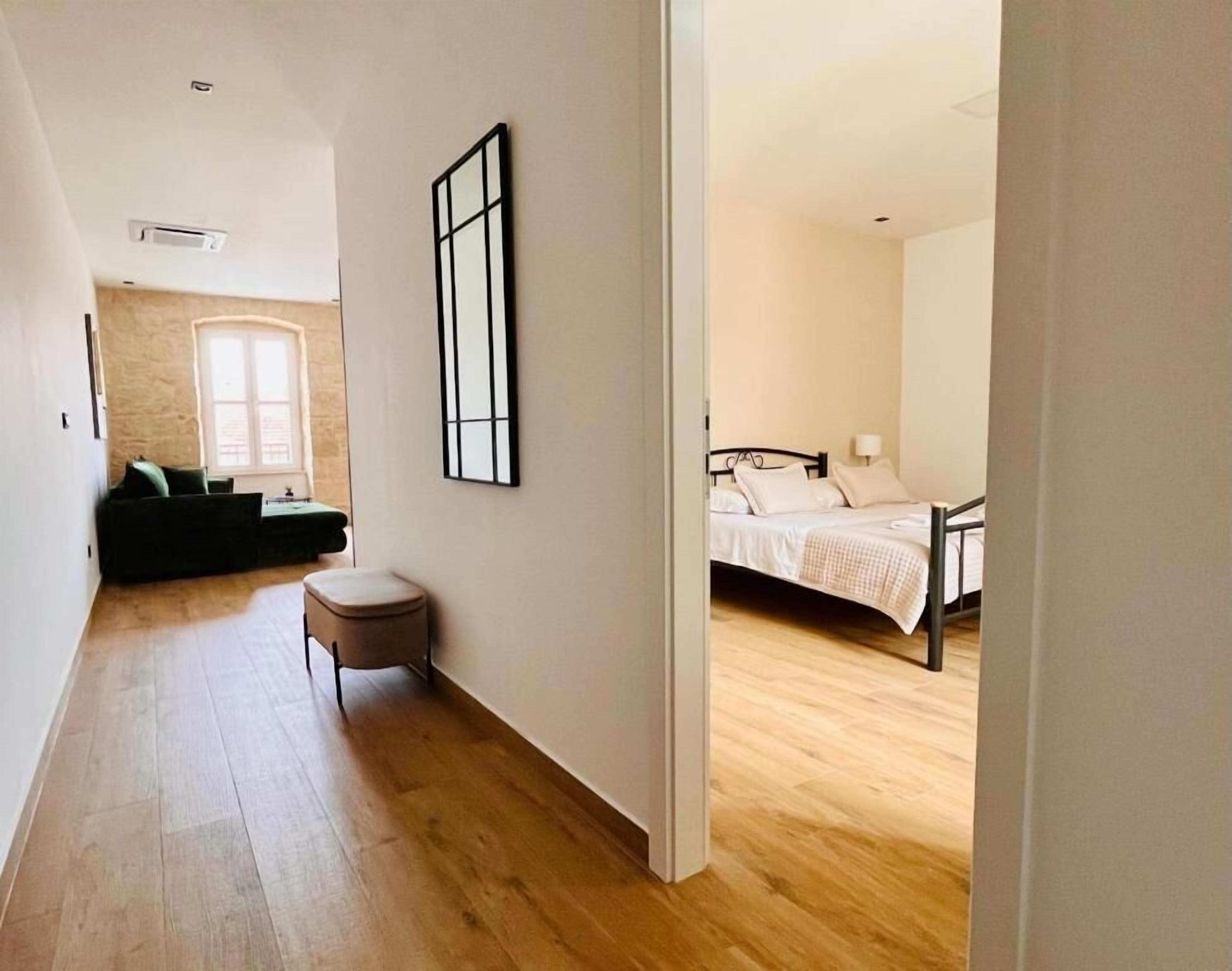 Comfort Apartment, City View | In-room safe, desk, blackout drapes, soundproofing