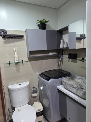 Standard Room, 1 Bedroom | Bathroom | Shower, free toiletries, towels, soap - Shore 2 Residences (Pasay)