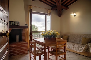 Apartment, Balcony, City View | Living area - Casa Lino Saturnia (Manciano)