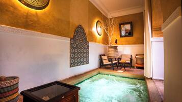 Indoor pool, open 9:00 AM to 9:30 PM, pool umbrellas, sun loungers