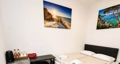Double room with bed, desk and refrigerator. room :11