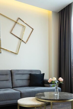 Suite Standard, vue ville | Coin séjour