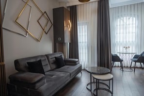 Suíte superior, vista para o mar | Área de estar