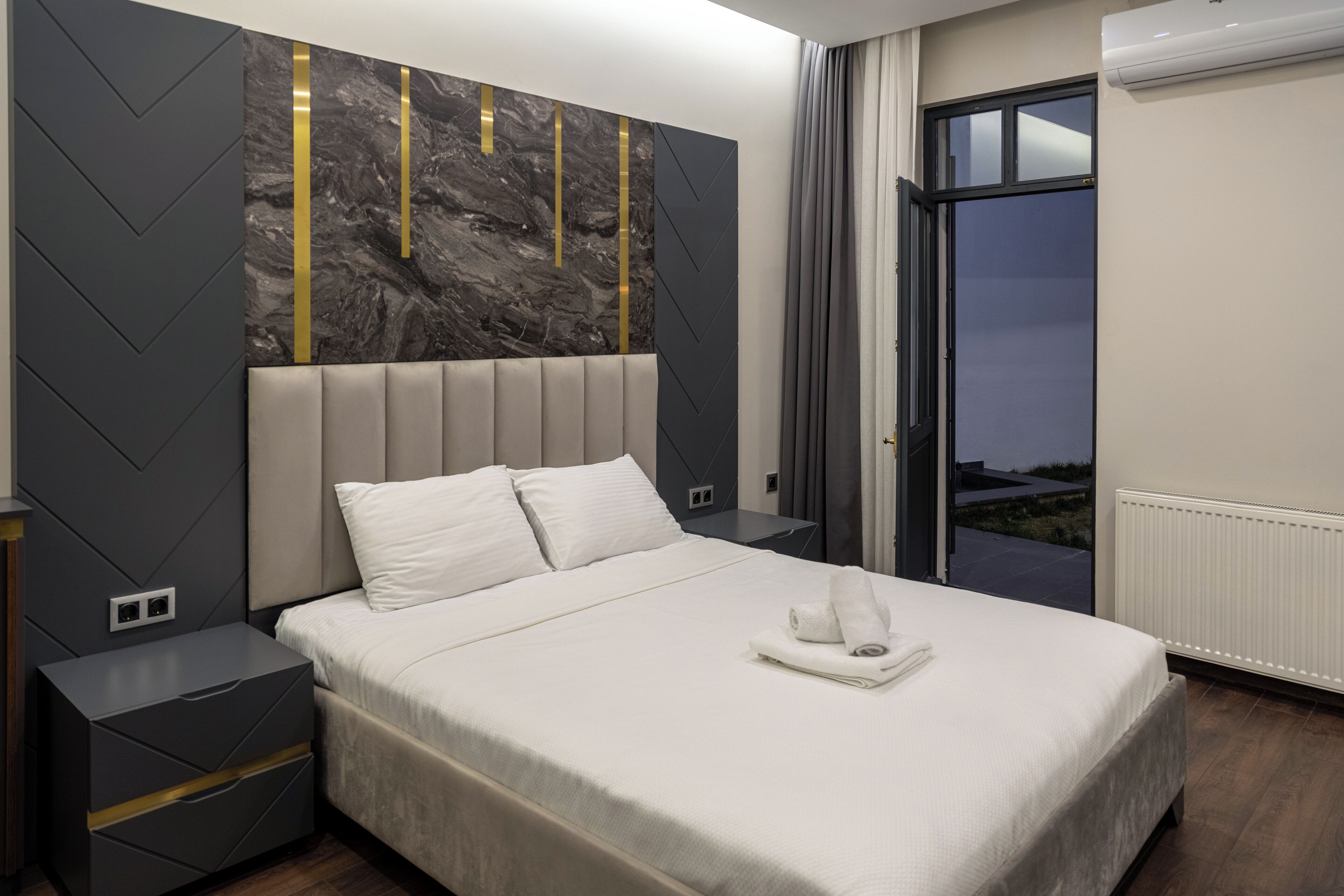 Deluxe Suite, Patio, Garden View | Blackout curtains, soundproofing, iron/ironing board, free WiFi