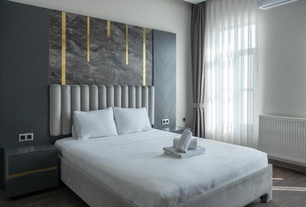 Suíte superior, vista para o mar | Cortinas blackout, quartos à prova de som, ferros/tábuas de passar roupa