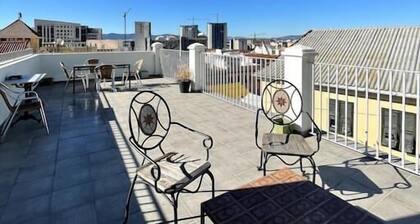 Stylish 1BR City Apartment with Stunning Rooftop Terrace