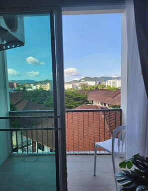 Condo, 1 Bedroom, Accessible, Smoking | Balcony - Charming Condo in Wichit Comfort Meets Convenience (Wichit)
