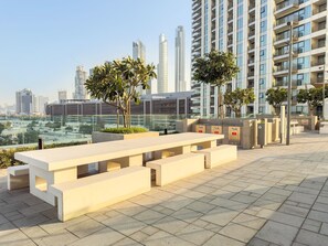 Outdoor dining - FIRST CLASS | 2BR | Pool & Burj Khalifa View (Downtown)