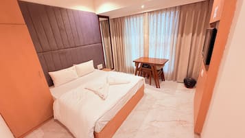 Deluxe Room | Premium bedding, memory-foam beds, laptop workspace, free WiFi