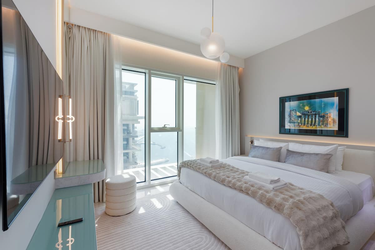 Premium Apartment, 1 Bedroom, Balcony, Partial Sea View | In-room safe, desk, laptop workspace, blackout drapes