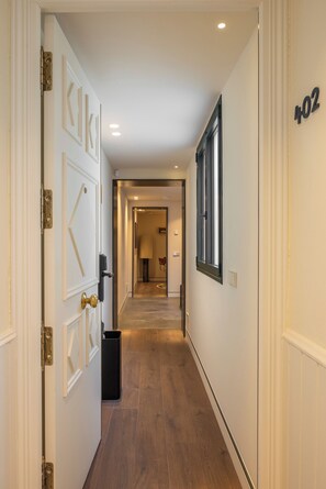 Deluxe Apartment, 2 Bedrooms | Living area - POSTCODE Chueca (Madrid)