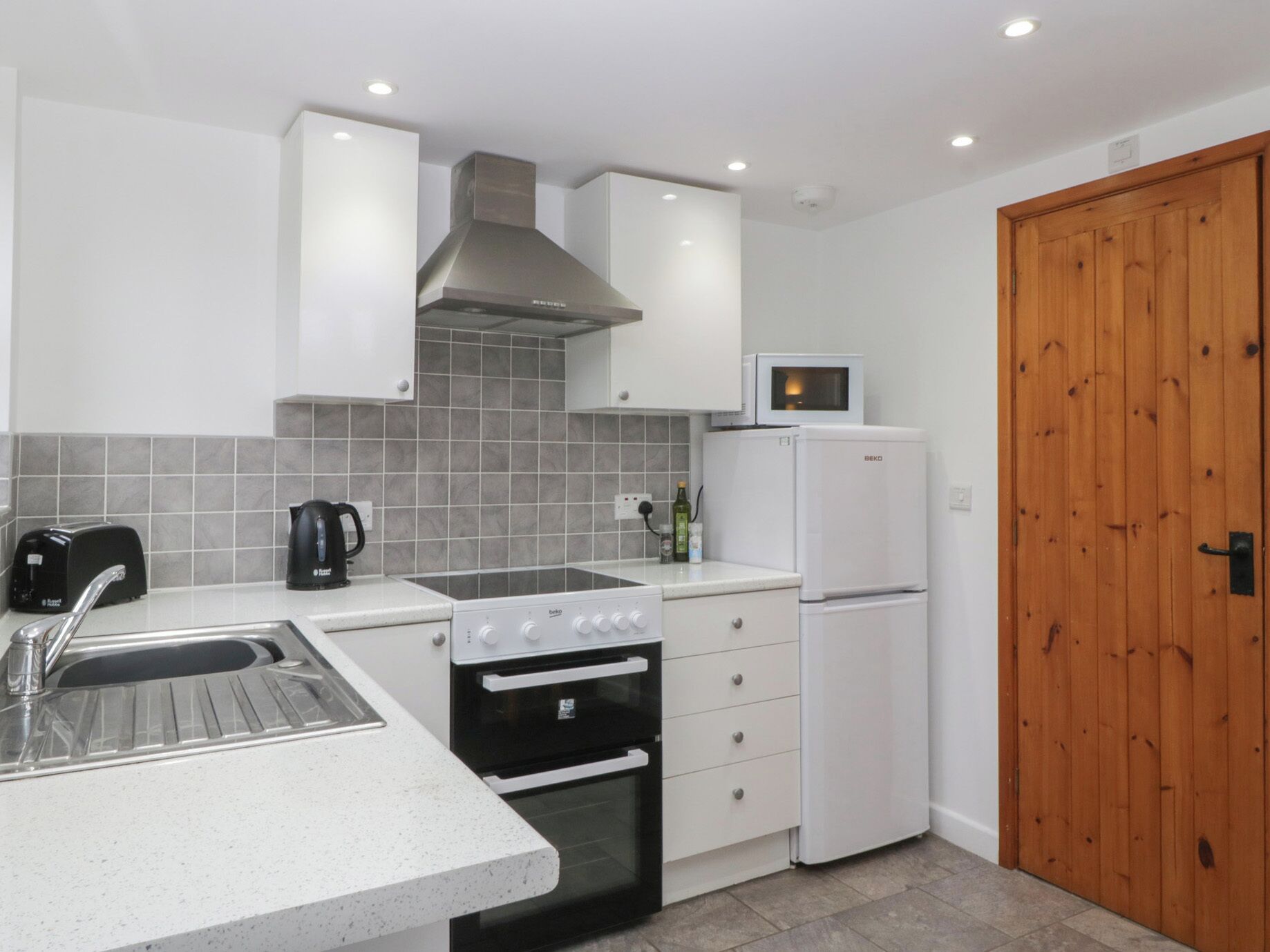 Fridge, microwave, toaster, cookware/dishes/utensils