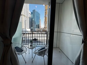 Deluxe Studio, Lake View | Terrace/patio - Stylish 1BR Lake View Retreat  (Dubai)