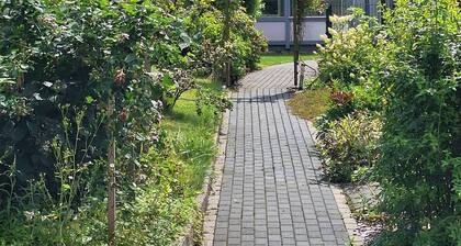 A cozy vacation apartment in a charming former hotel.