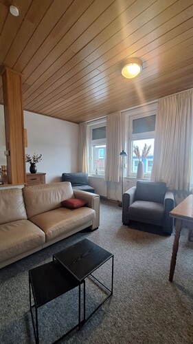 A cozy vacation apartment in a charming former hotel.