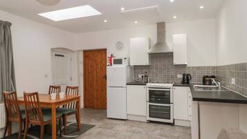 Fridge, microwave, toaster, cookware/dishes/utensils