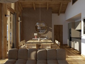 Ein moderner Essbereich mit einem großen Holztisch, Stühlen und einem einzigartigen runden Spiegel an der Wand.