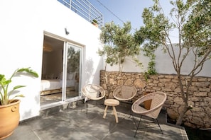 Comfort vierpersoonskamer, patio | Terras
