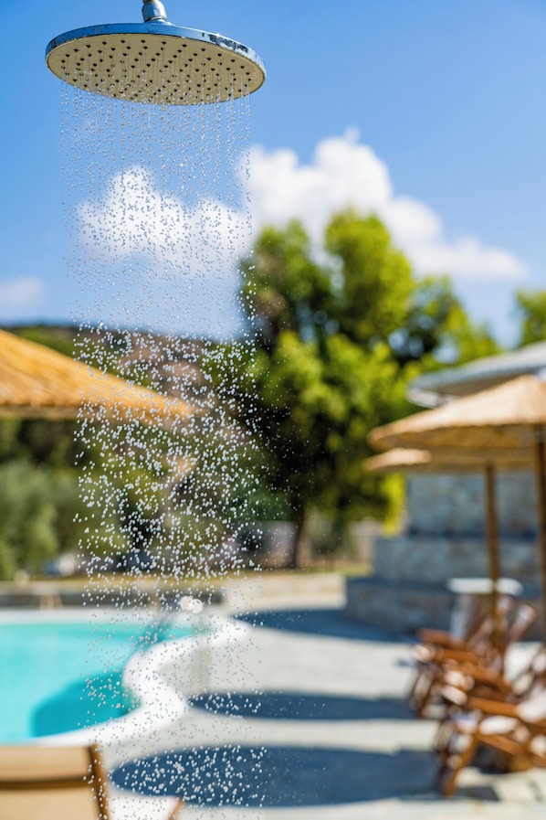 Outdoor pool, open 11:00 AM to 8:00 PM, pool umbrellas, sun loungers