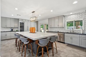 Fridge, microwave, stovetop, dishwasher - Remodeled Palm Desert Home by El Paseo: Mountain views, pool&spa, outdoor kitchen, sleeps 8 (Palm Desert)