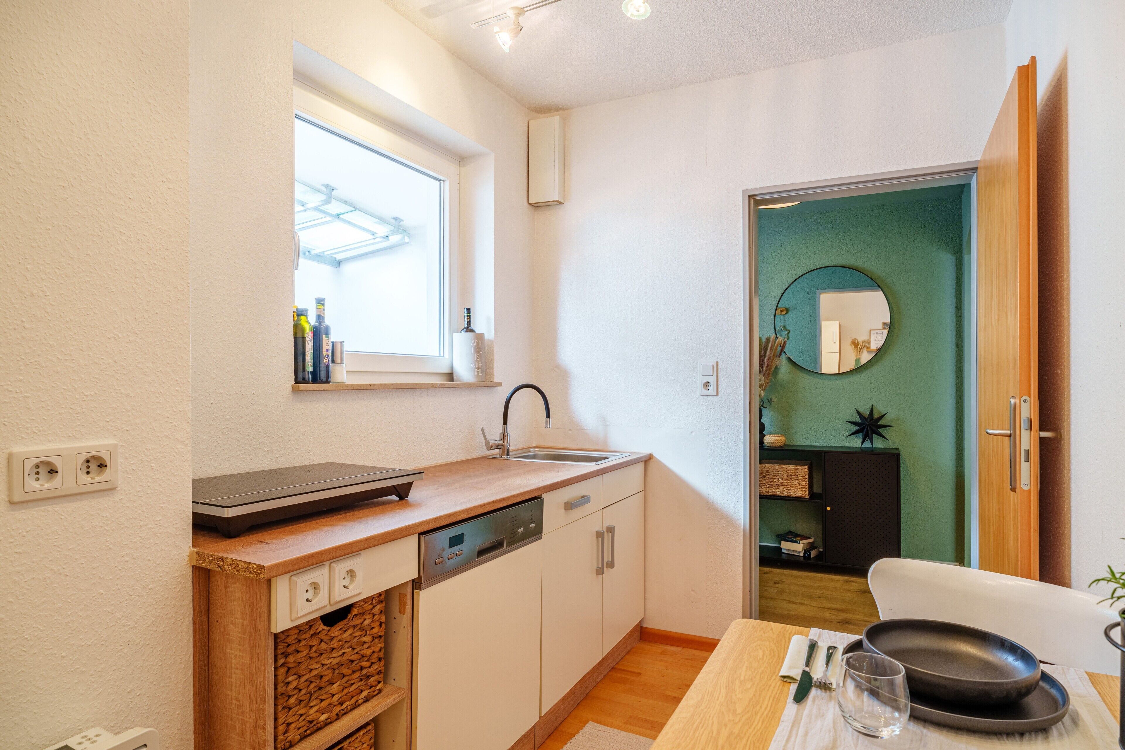 Fridge, stovetop, dishwasher, coffee/tea maker