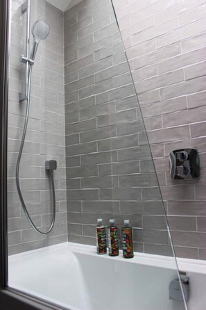 Shower, hair dryer, towels, soap - Historic Hoylake Lifeboat Station remodelled into a luxury penthouse apartment (Hoylake)