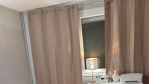 A bedroom with a single bed, a desk, a chair, a lamp, and a small trash bin. - Free room/parking and bus in front (Amiens)