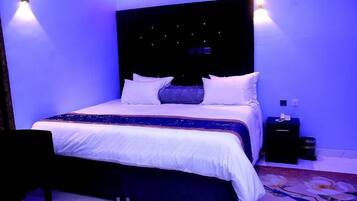 Family Room, Balcony, City View | Desk, laptop workspace, blackout drapes, soundproofing