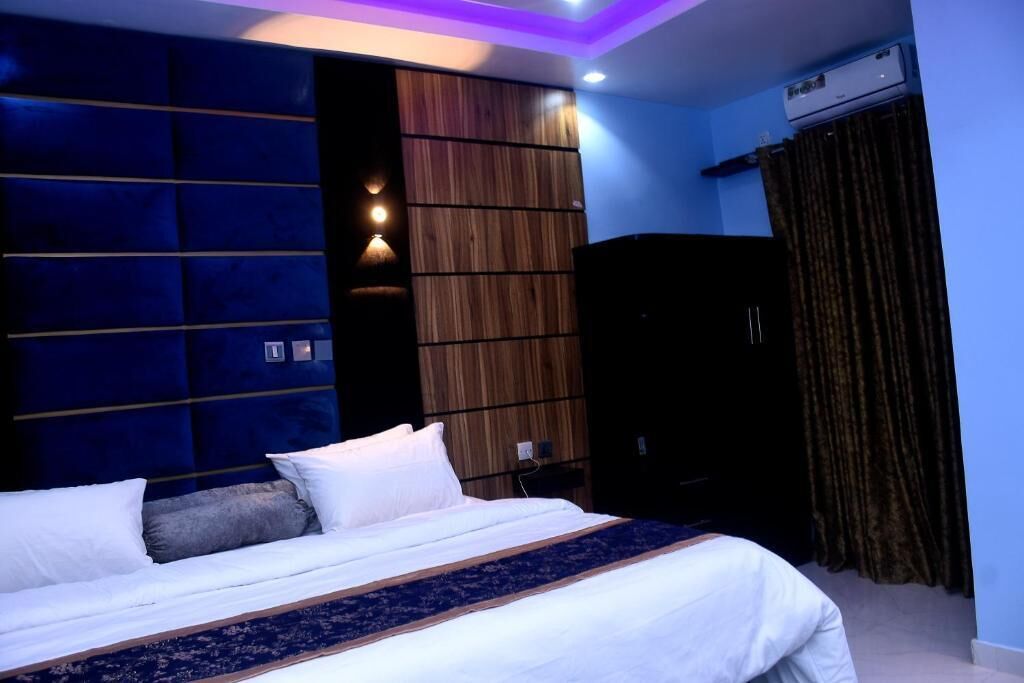 Family Room, Balcony, City View | Desk, laptop workspace, blackout drapes, soundproofing